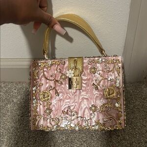 Elegant Pink and Gold Embellished Handbag